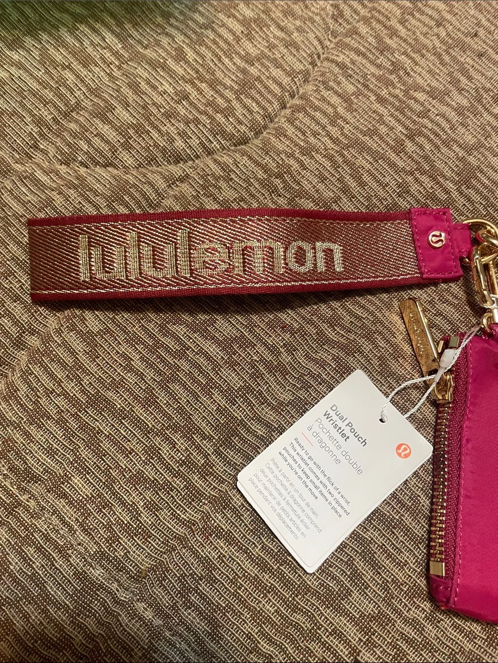 lululemon athletica pink dual pouch wristlet with logo strap